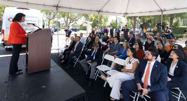 Kelly Bruno-Nelson, Executive Director of Medi-Cal/CalAIM speaks during the grand opening...